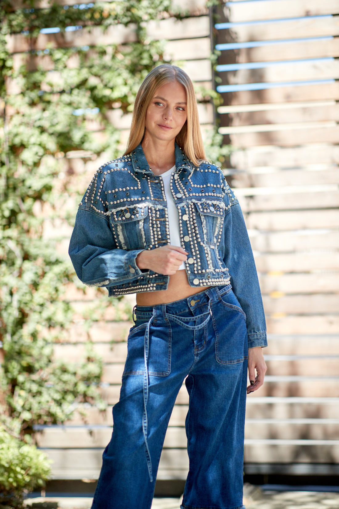 Baller Full Length Distressed and Studded Denim Jacket