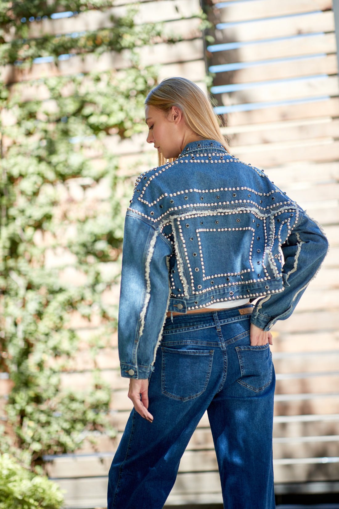 Baller Full Length Distressed and Studded Denim Jacket