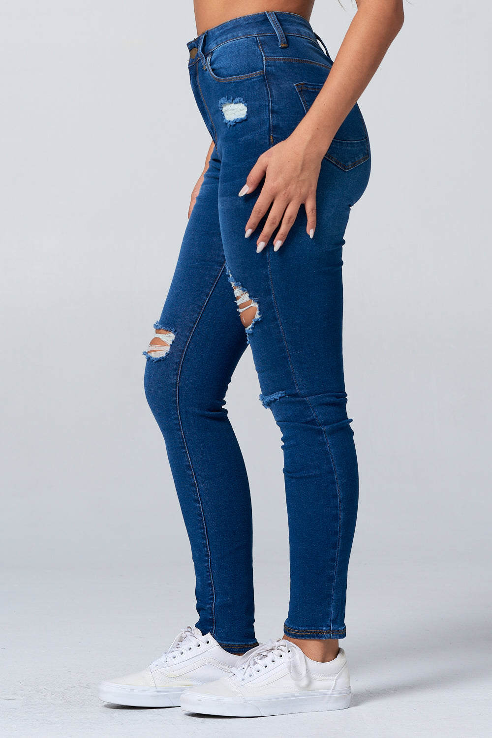 Ripped high rise store jeans